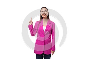 young stylish business assistant woman dressed in a bright pink jacket