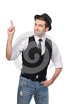 Young stylish caucasian man pointing with his finger upwards.