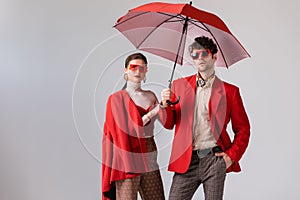 Young, stylish couple in red blazers