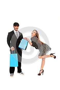 Young stylish couple with shopping bags