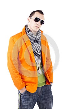 Young stylish guy with earphones and sunglasses