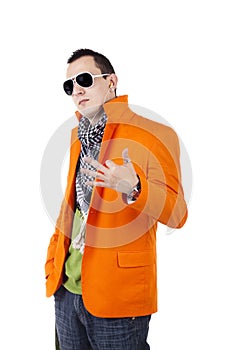 Young stylish guy with earphones and sunglasses