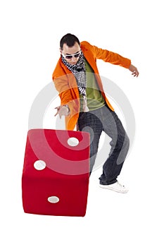 Young stylish guy rolling the dice