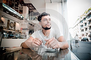 Young stylish man at the bar