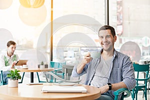 Young stylish man in cafe