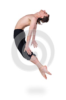 Young and stylish modern ballet dancer jumping