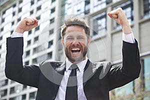 Young Successful Business Man Celebrating in City