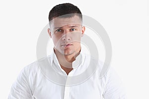 Young successful businessman on a white