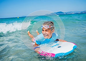 Young surfer girl