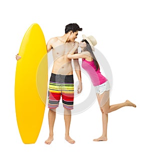 young surfer with girlfriend