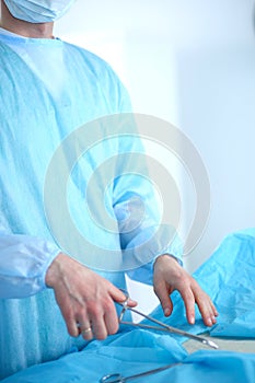 Young surgery team in the operating room . Operating room