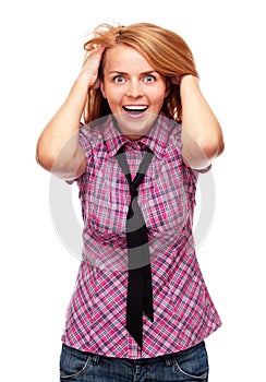 Young surprised woman standing on white background