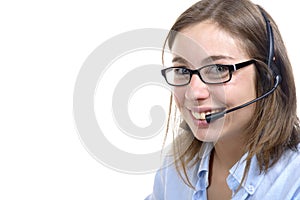 A young switchboard operator smiling at the camera