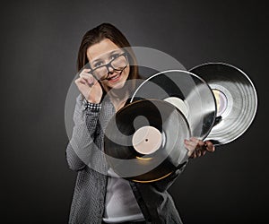 Young teen girl with vinyl records