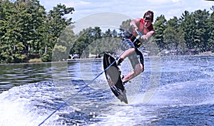 Young teen on wakeboard photo