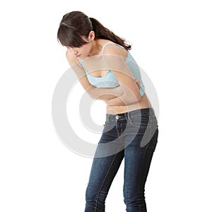 Young teen woman with stomach ache