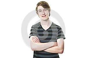 Young teenage boy being photographed in a studio.