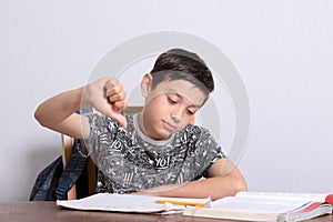 Young teenage boy doing his homework