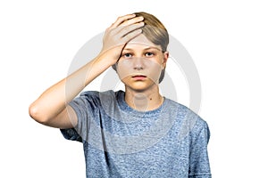 Young teenage boy with headache