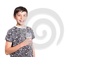 Young teenage boy with a milk moustache