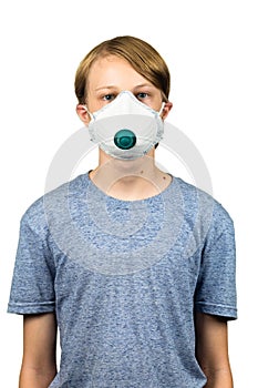 Young teenage boy wearing a protective mask. Isolated on white