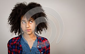 Young Teenage Girl With Afro Hair Thinking