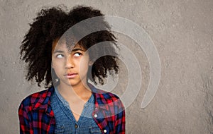 Young Teenage Girl With Afro Hair Thinking