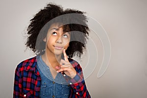 Young Teenage Girl With Afro Hair Thinking