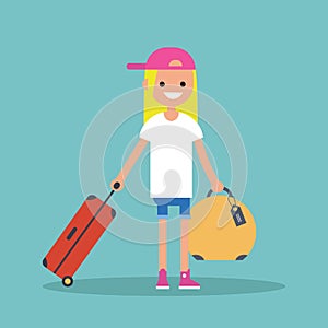 Young teenage girl travelling with her luggage