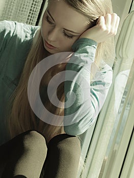 Young teenage sad woman