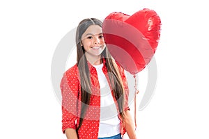 Young teenager child girl with heart shape balloon. Happy Valentines Day. Love and pleasant feelings concept. Portrait