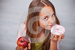 Young teenager girl craving sugary food