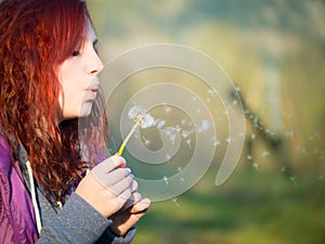 Young teenager girl with red hairs