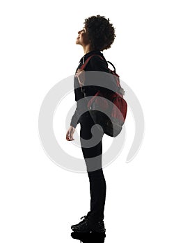 Young teenager girl woman standing looking up shadow silhouette