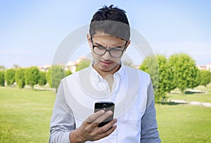 Young teenager with smartphone.