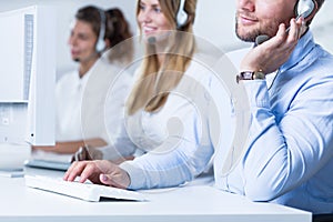 Young telemarketers in the office