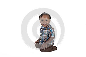 Young toddler isolated against a white background