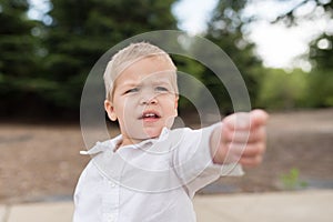 Young Toddler Portrait Outside Pointing