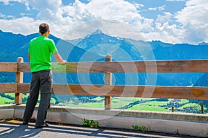 Young tourist and alpine landscape, Austria, Alps