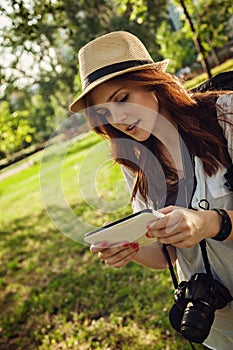 Young Tourist Girl Using Digital Tablet