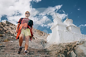 Young tourist man visit the tibetian holy places in Himalaya mountain