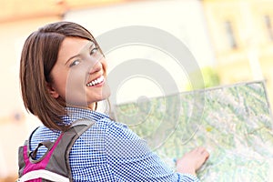 Young tourist with a map