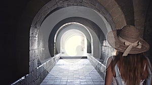 Young Tourist woman exploring European town Beautiful girl walking through street travelling enjoying summer vacation