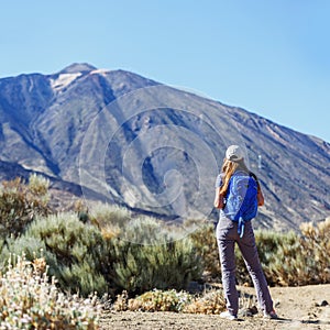 Young tourist woman near the Teide volcano