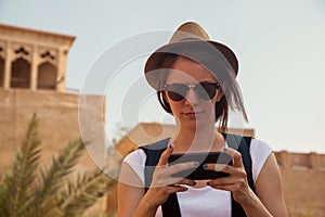 Young Tourist Woman Using Smart Phone