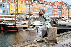 Young tourist woman visiting Scandinavia