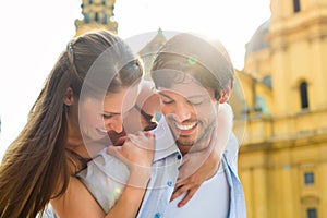 Young Tourists in city in front of church