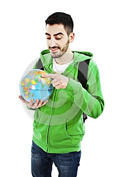 Young traveler with globe