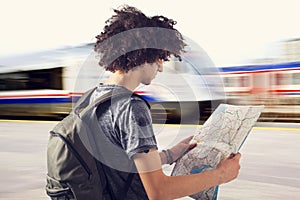 Young traveler on train station