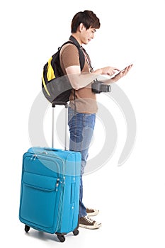 young traveler using tablet pc